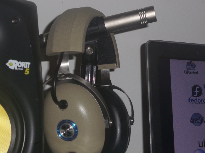 Home Studio Studio monitor, mic, headphones, and laptop