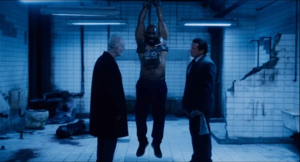 Saw X Jigsaw and Detective Hoffman with bound black man
